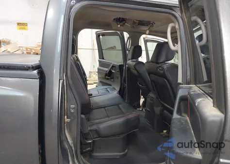 2009 Nissan Titan Pro-4X z USA, uszkodzony, nr VIN 1N6BA07C09N306361